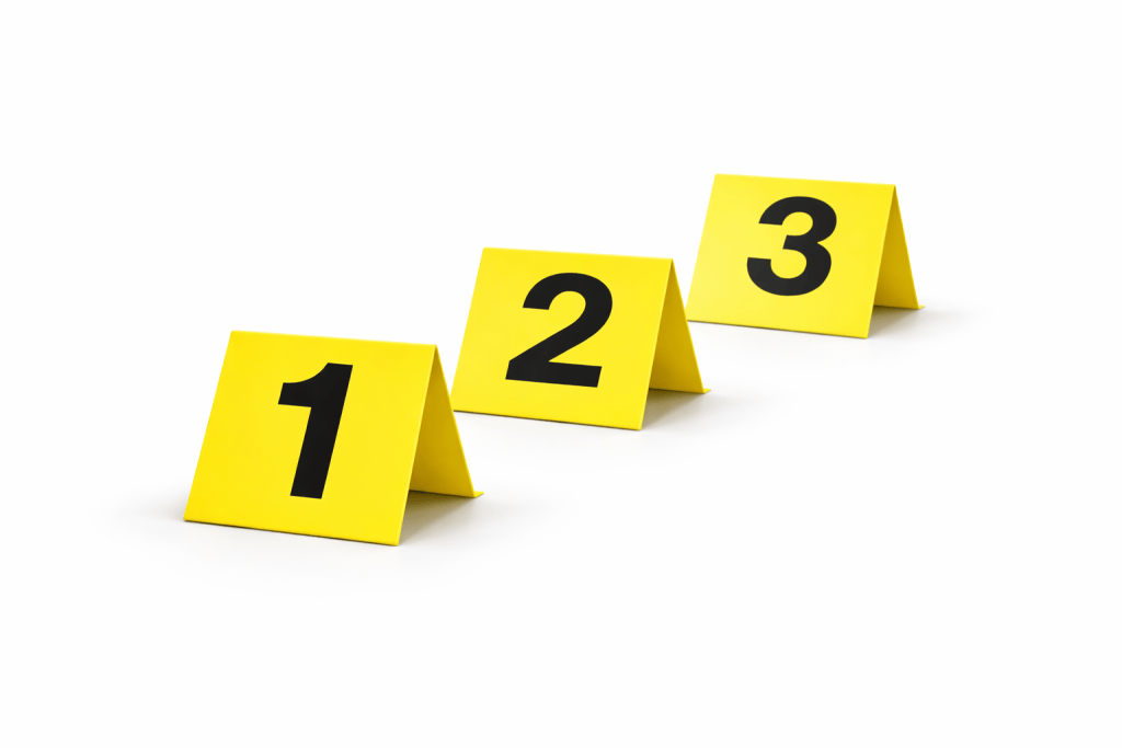 Evidence placards used in crime scene investigation training for scene processing and documentation